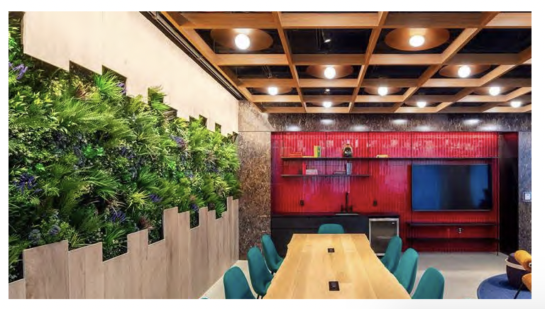 Modern conference room with modular green wall panels